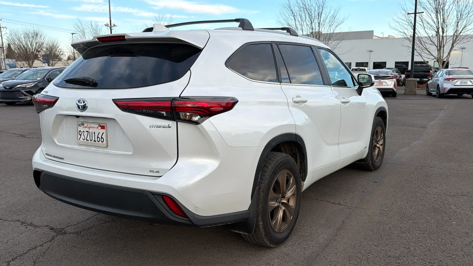 2023 Toyota Highlander Hybrid Bronze Edition